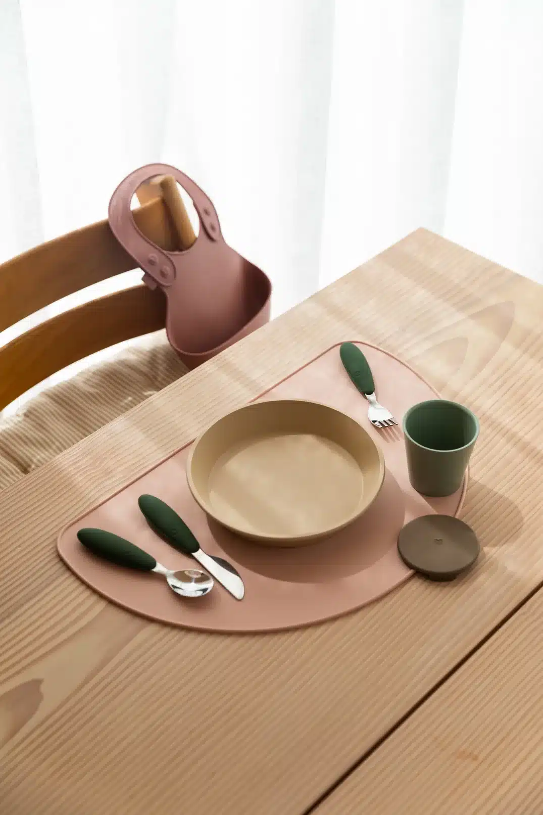BIBS cutlery set in colors Dark Oak, Woodchuck, Hunter Green, and Iron.